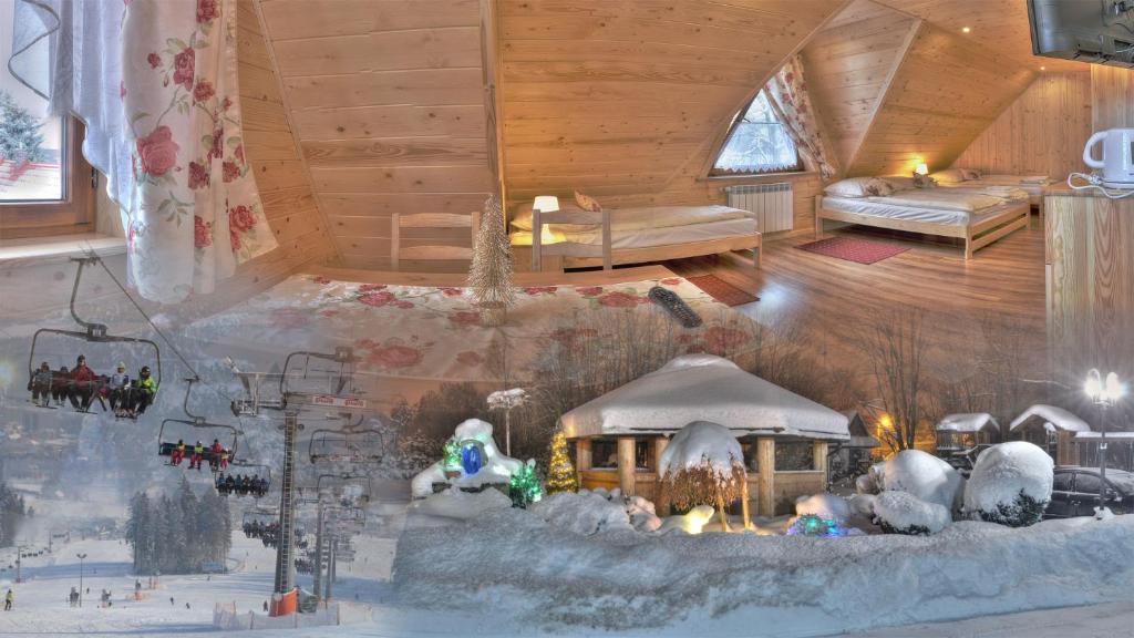 Apartamenty u Piekorza في شافلاري: نموذج منزل في غرفة مع ثلج