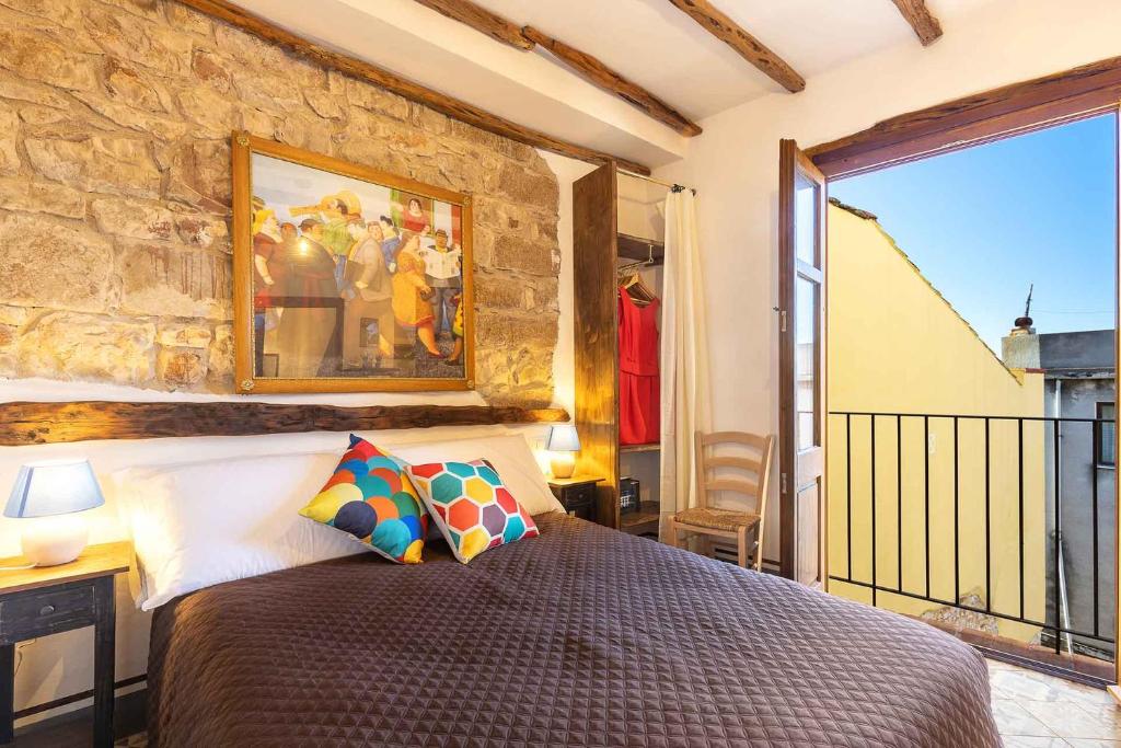 En eller flere senge i et værelse på Le Fanciulle - Alexandra