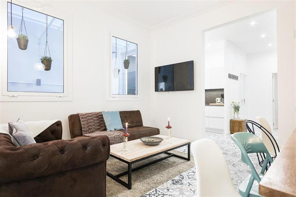 Televízia a/alebo spoločenská miestnosť v ubytovaní Apartment in downtown Barcelona - Vintage