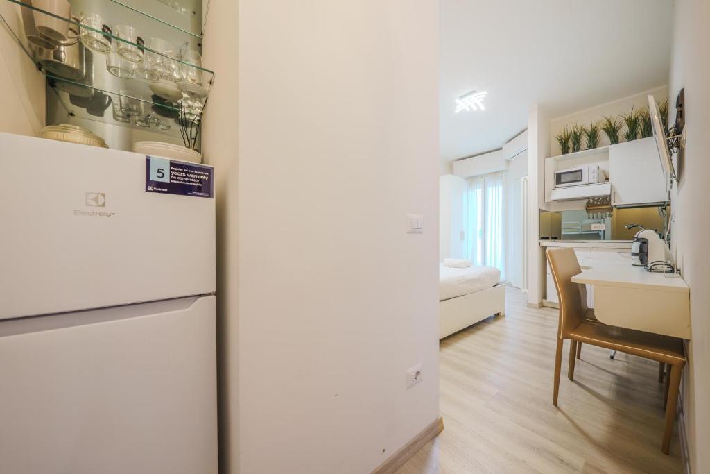 Kuchyň nebo kuchyňský kout v ubytování Cristel Apartment - 15 min da Milano