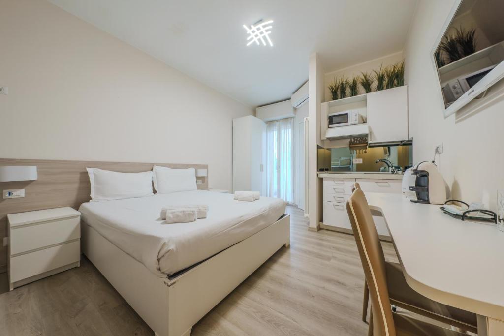 Postel nebo postele na pokoji v ubytování Cristel Apartment - 15 min da Milano