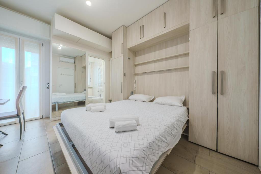 Postel nebo postele na pokoji v ubytování Cristel Apartment - 15 min da Milano