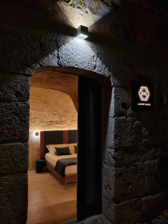 Postel nebo postele na pokoji v ubytování Iris Luxury Suite