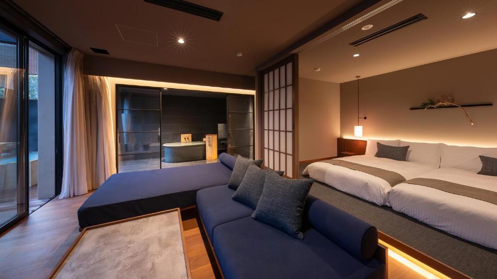 Postel nebo postele na pokoji v ubytování Nasu-Onsen Shinshun no Kago Hewitt Resort