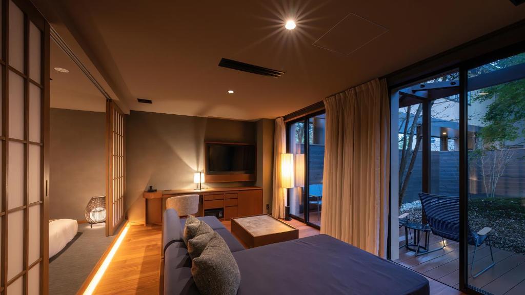 Postel nebo postele na pokoji v ubytování Nasu-Onsen Shinshun no Kago Hewitt Resort