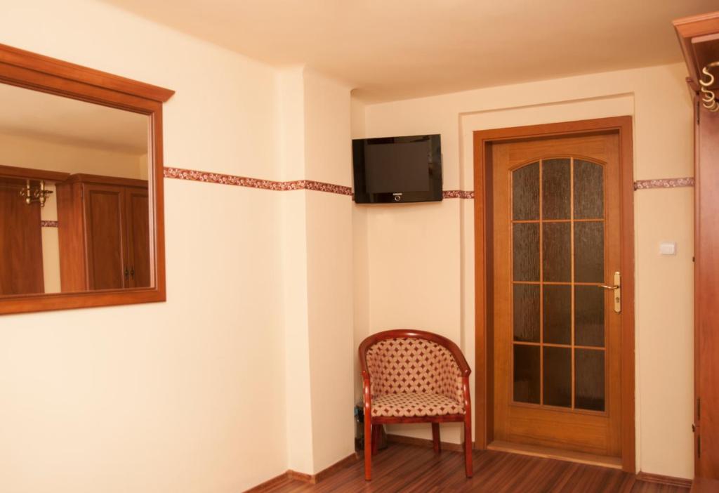 TV a/nebo společenská místnost v ubytování Hotel Bow Garden