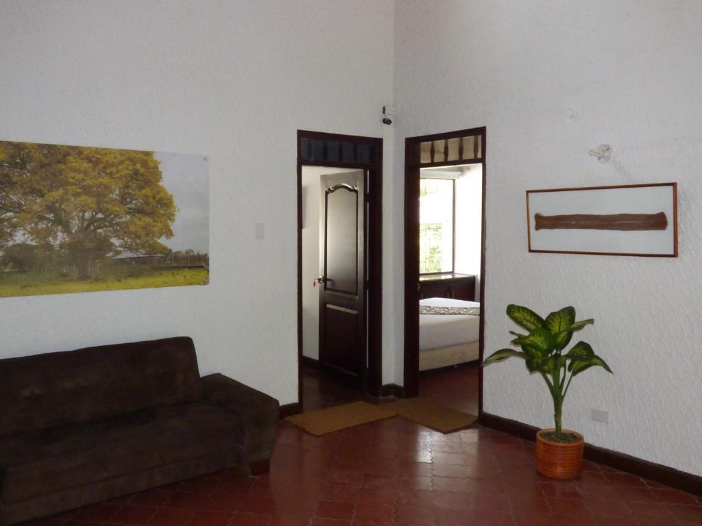 Postel nebo postele na pokoji v ubytování Hostal Mizare Valledupar