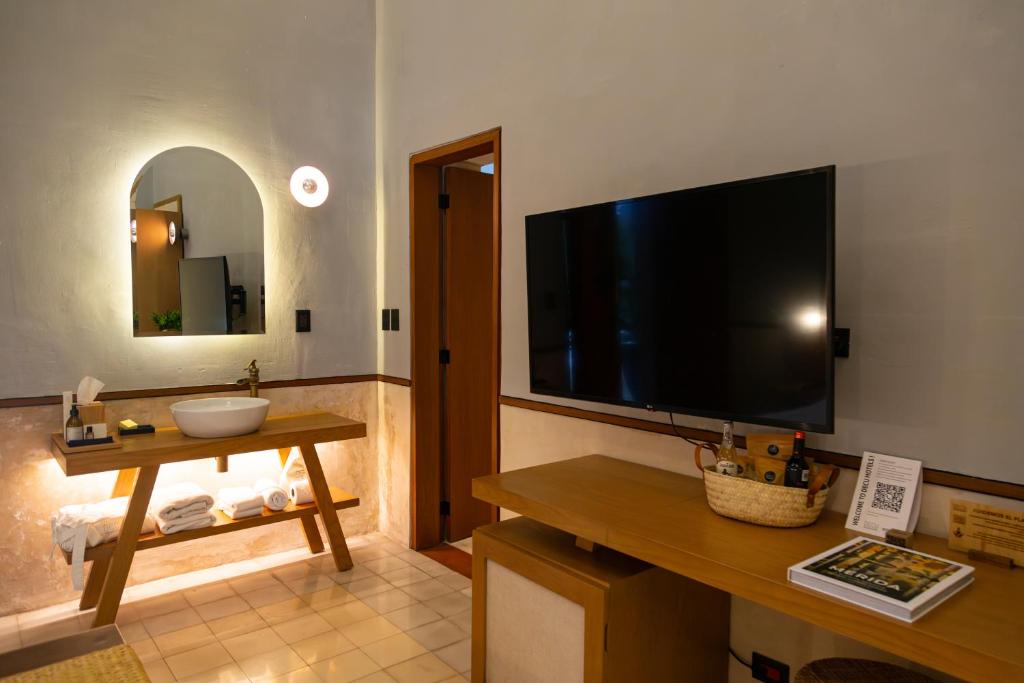 TV a/nebo společenská místnost v ubytování DECU DOWNTOWN