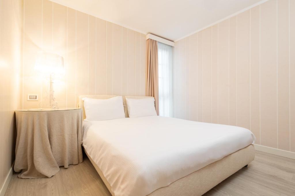 Postel nebo postele na pokoji v ubytování Hotel Eden