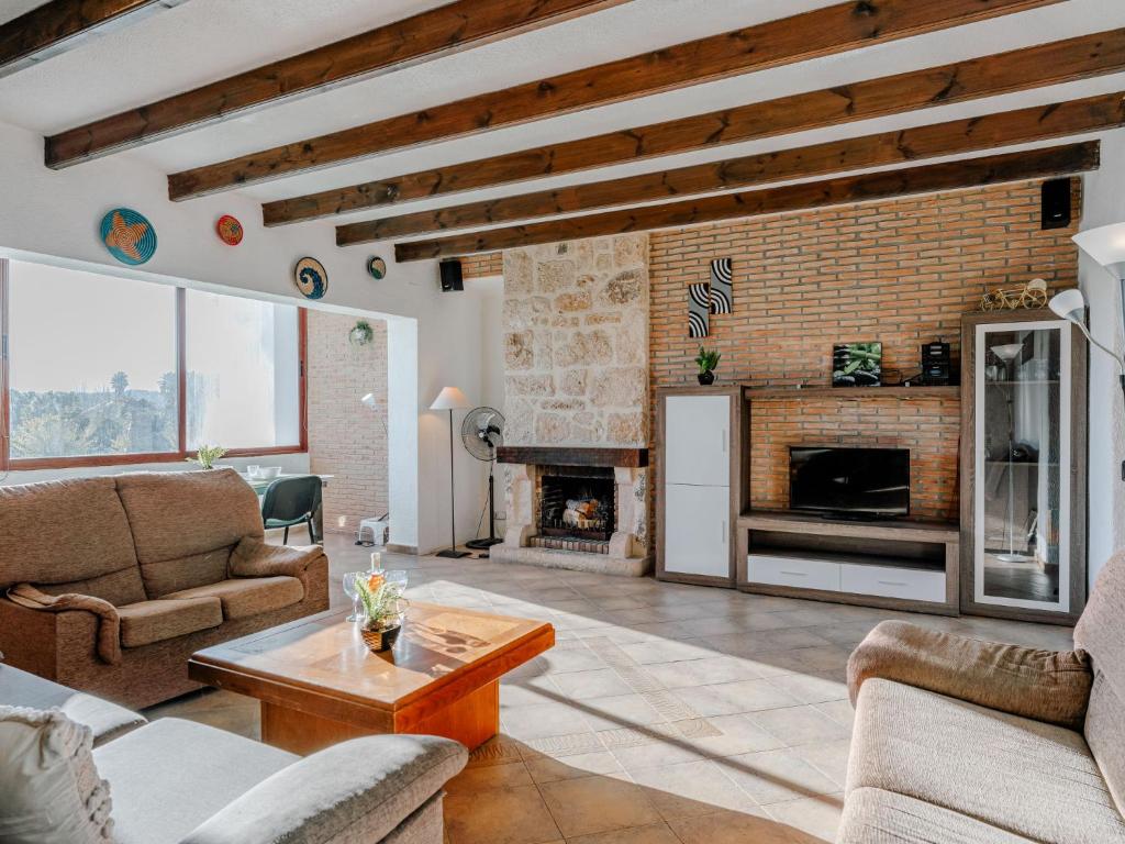 Posezení v ubytování Apartment Pla by Interhome