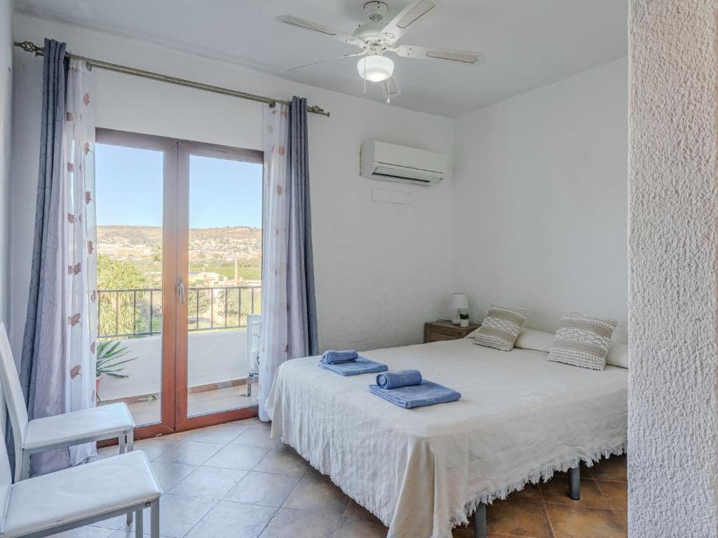 Postel nebo postele na pokoji v ubytování Apartment Pla by Interhome