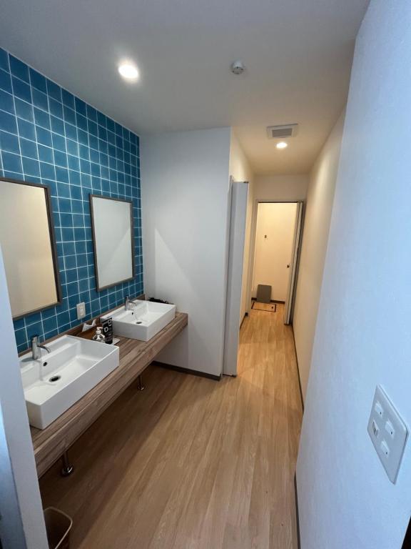 Koupelna v ubytování Guesthouse NALUノ道