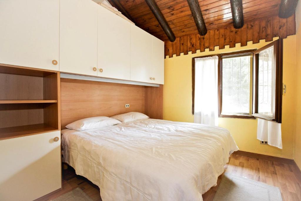 Letto o letti in una camera di Rustico La Vigna