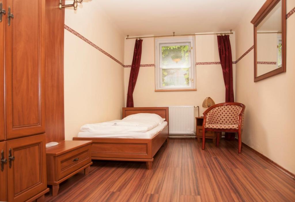Postel nebo postele na pokoji v ubytování Hotel Bow Garden