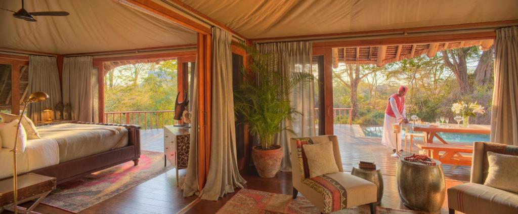 Posezení v ubytování Finch Hattons Luxury Tented Camp