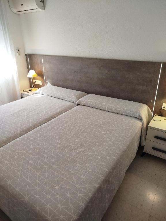 Postel nebo postele na pokoji v ubytování Apartamento centrico