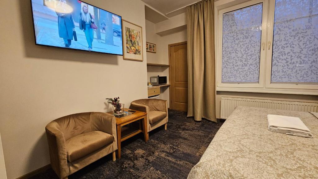 TV a/nebo společenská místnost v ubytování Nileja