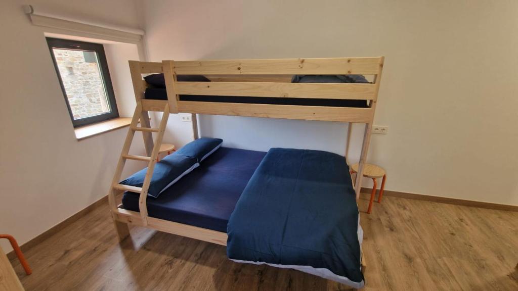 Postel nebo postele na pokoji v ubytování Albergue La Incera