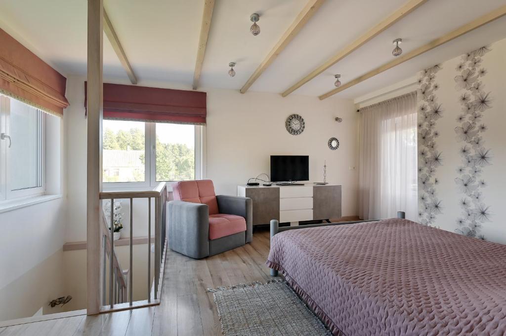 Postel nebo postele na pokoji v ubytování Guest house Kajaki-Ragaciems