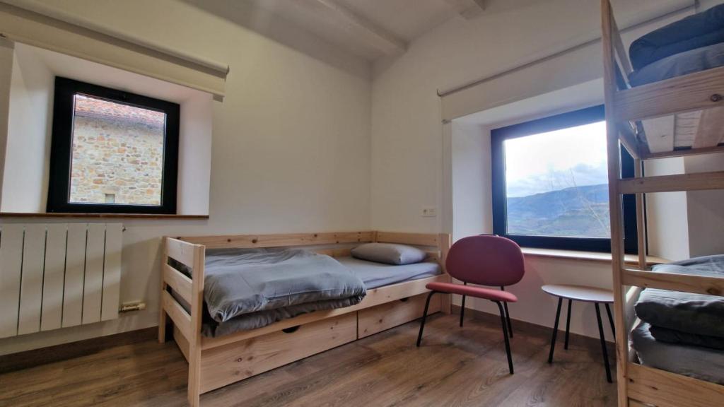 Postel nebo postele na pokoji v ubytování Albergue La Incera