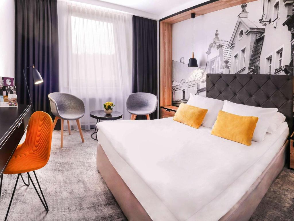Posteľ alebo postele v izbe v ubytovaní Mercure Jelenia Góra