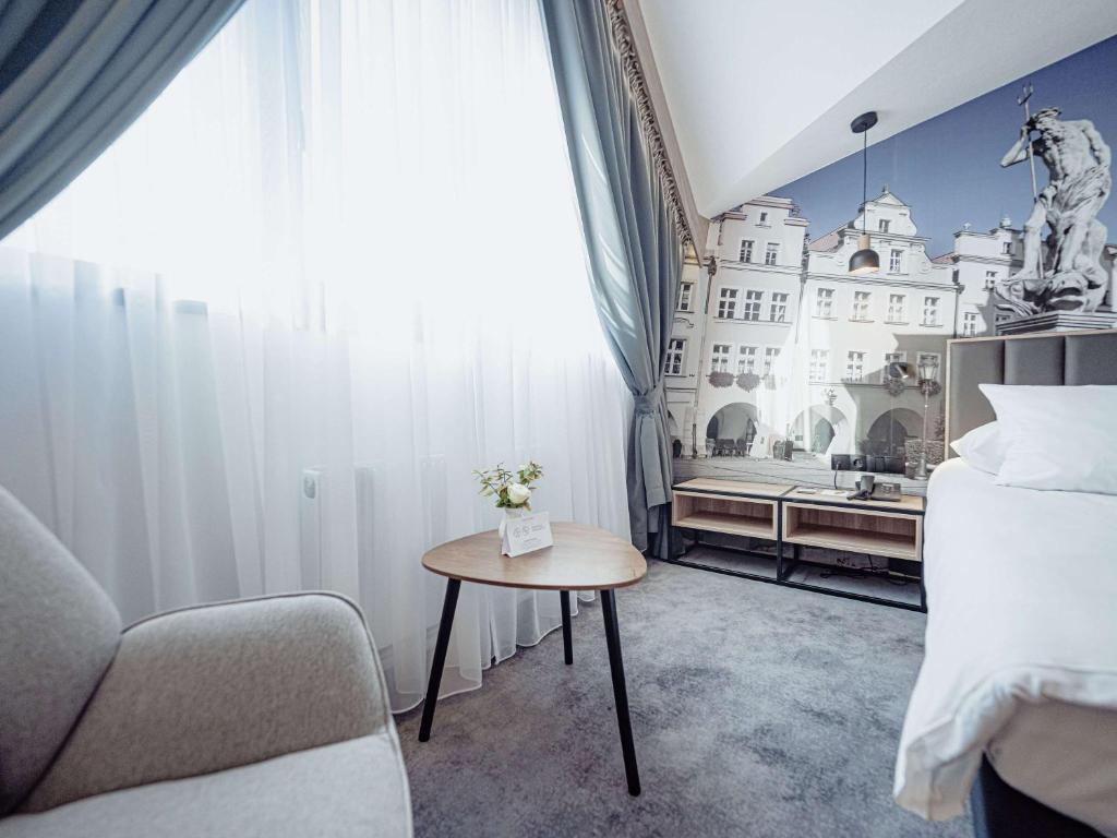 Posteľ alebo postele v izbe v ubytovaní Mercure Jelenia Góra