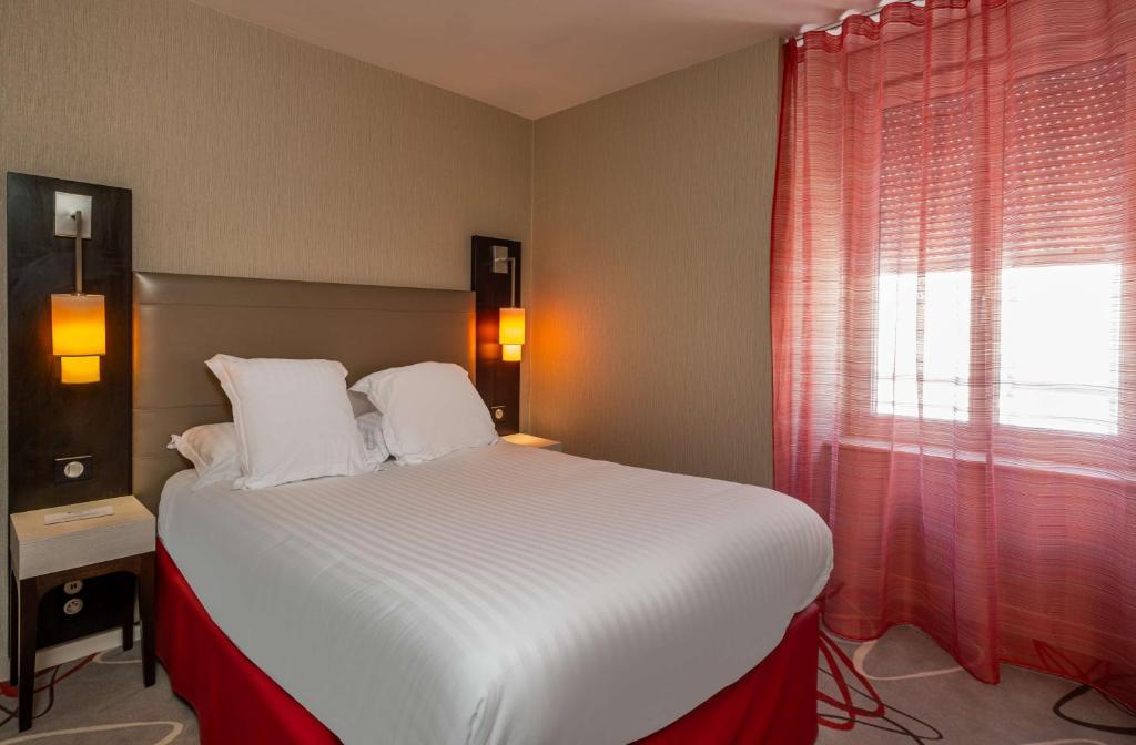 Postel nebo postele na pokoji v ubytování Best Western Plus Richelieu