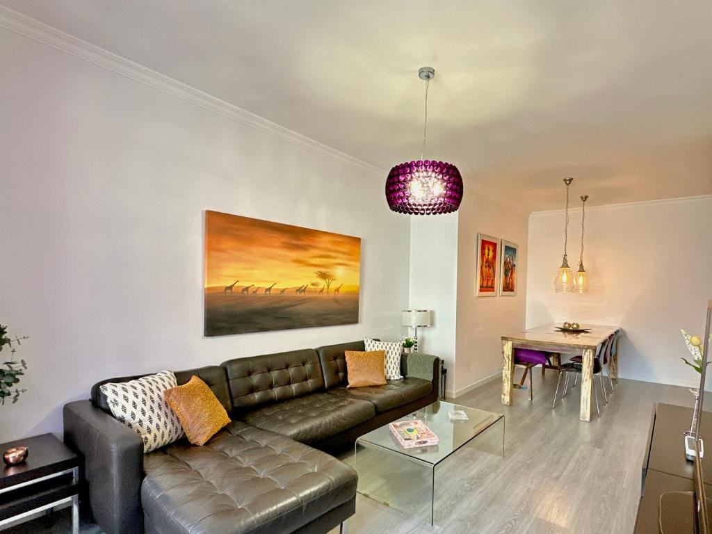 Posezení v ubytování HostiGuest CoLiving León y Castillo