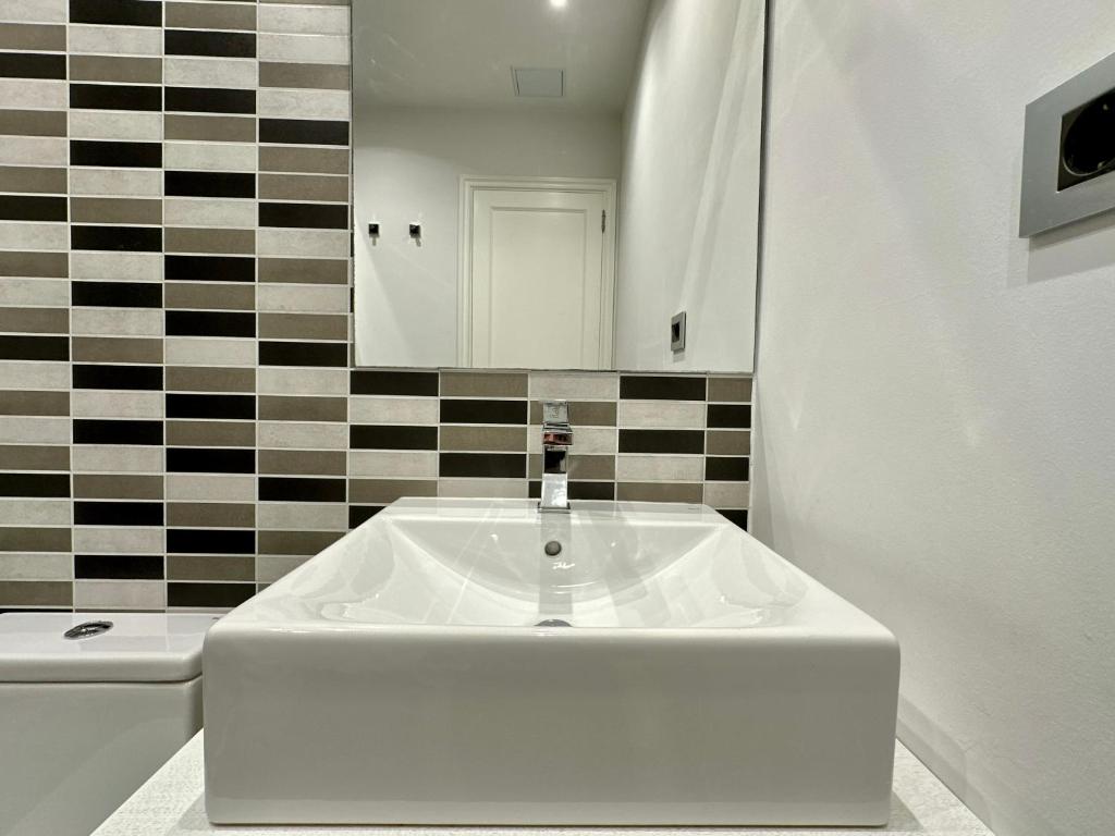 Koupelna v ubytování HostiGuest CoLiving León y Castillo