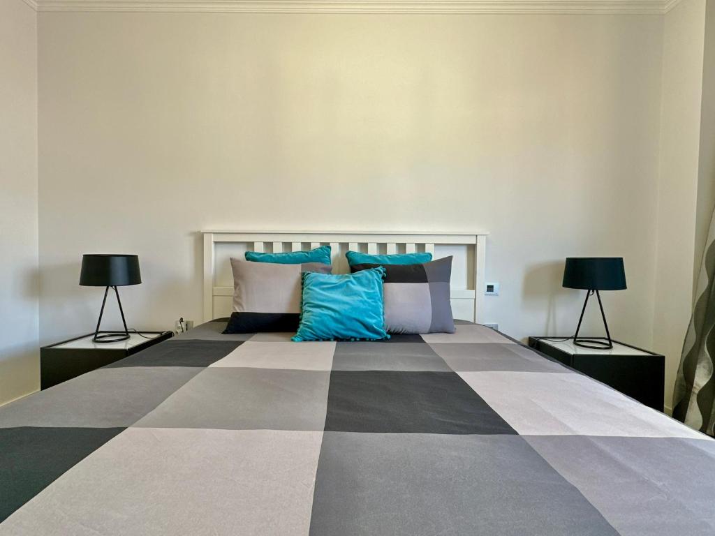 Postel nebo postele na pokoji v ubytování HostiGuest CoLiving León y Castillo
