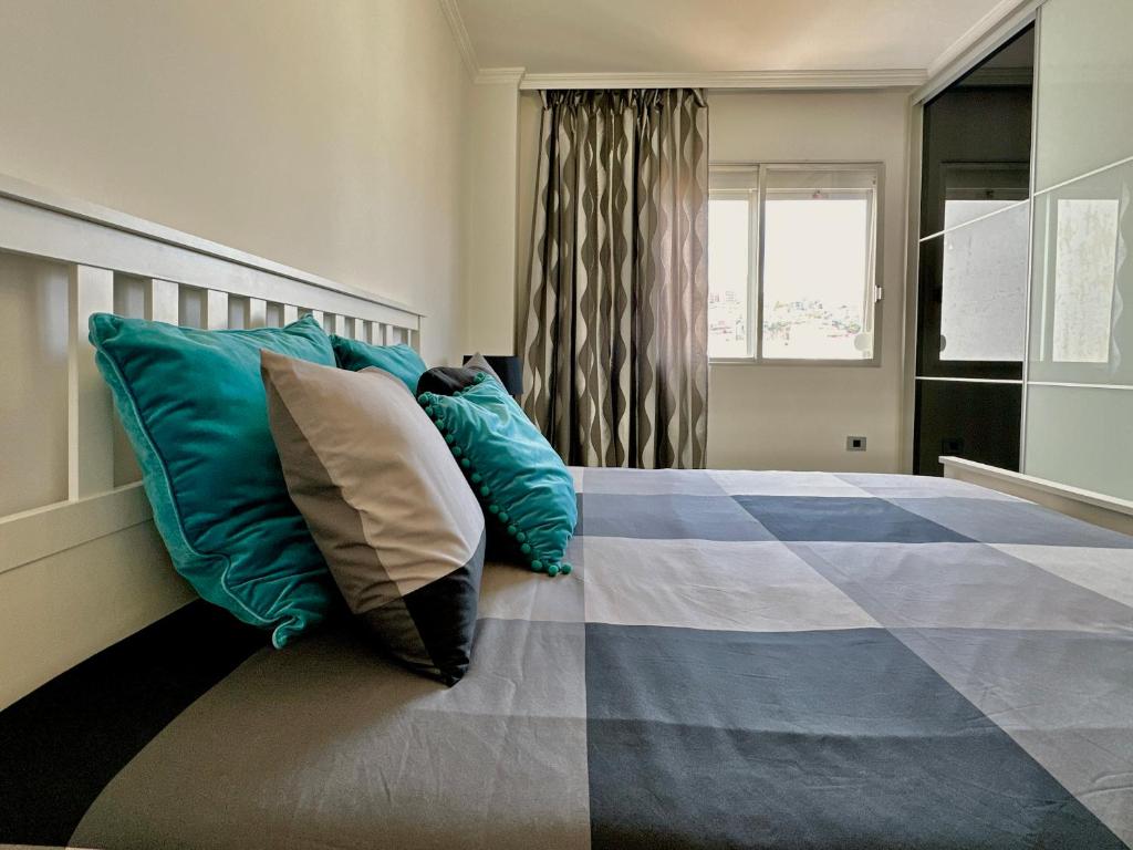 Postel nebo postele na pokoji v ubytování HostiGuest CoLiving León y Castillo