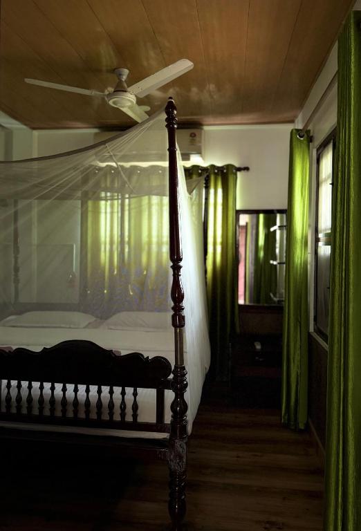 Postel nebo postele na pokoji v ubytování Reds Residency - Homestay