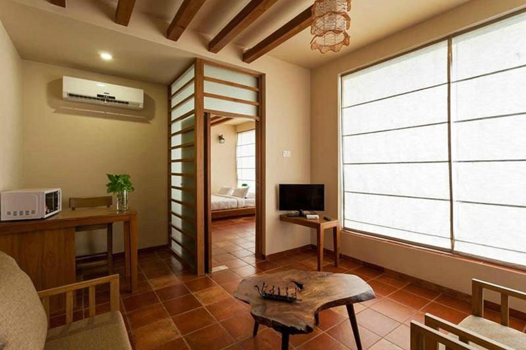 TV a/nebo společenská místnost v ubytování K Tree Boutique Hotel, Kolhapur
