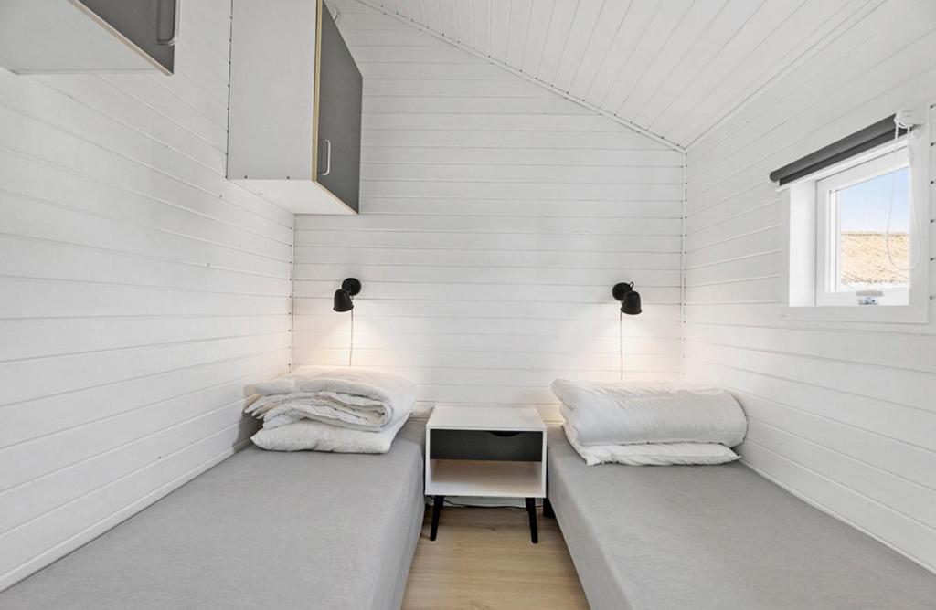 Letto o letti in una camera di First Camp Holbæk Fjord
