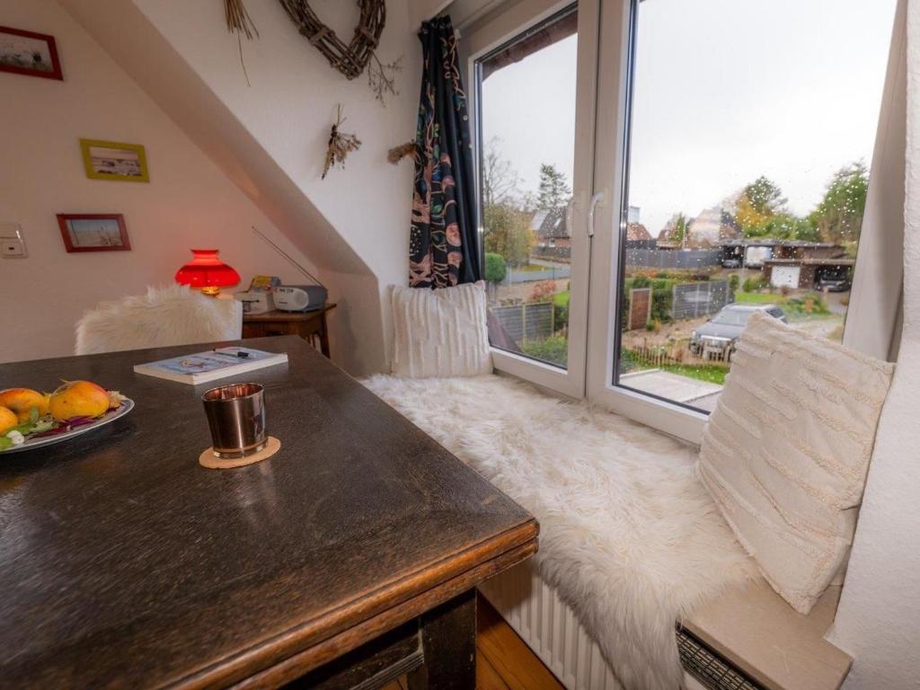 Posezení v ubytování 194 Fewo Dat LütjeHuus mit Dachterrasse im ersten Stock