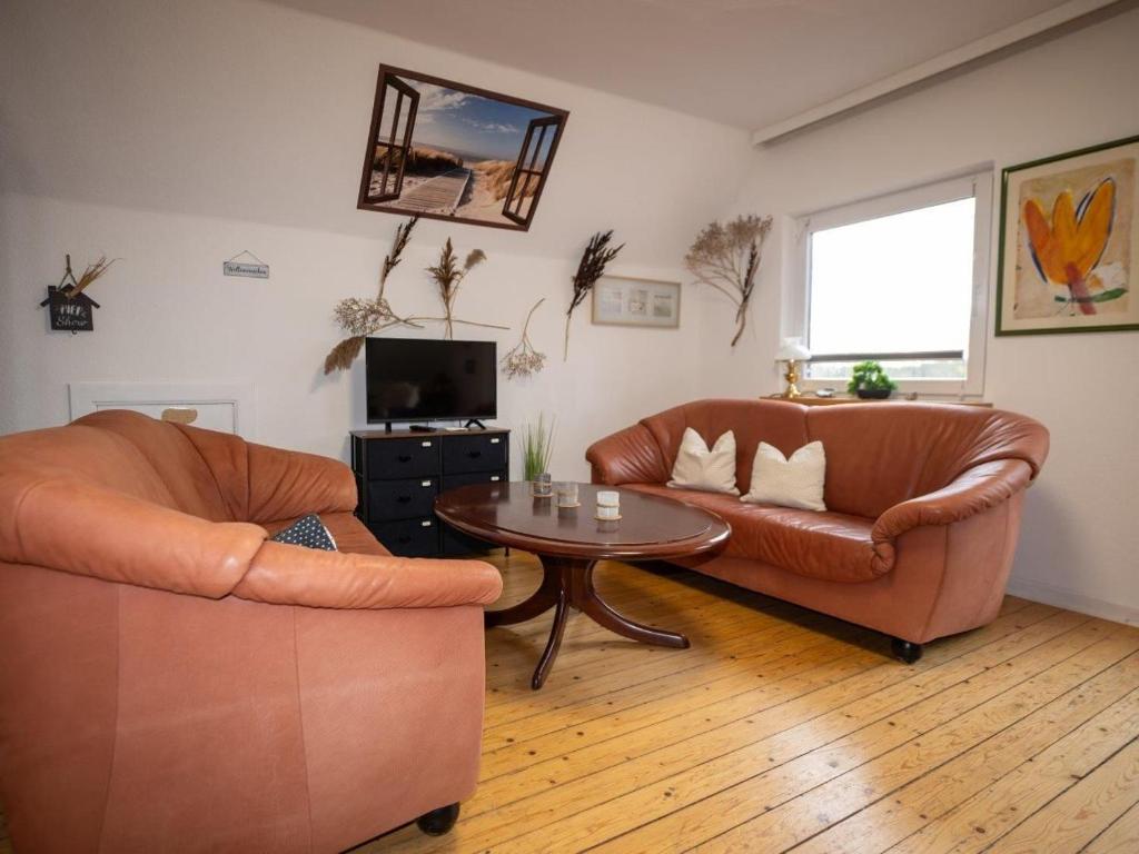 Posezení v ubytování 194 Fewo Dat LütjeHuus mit Dachterrasse im ersten Stock