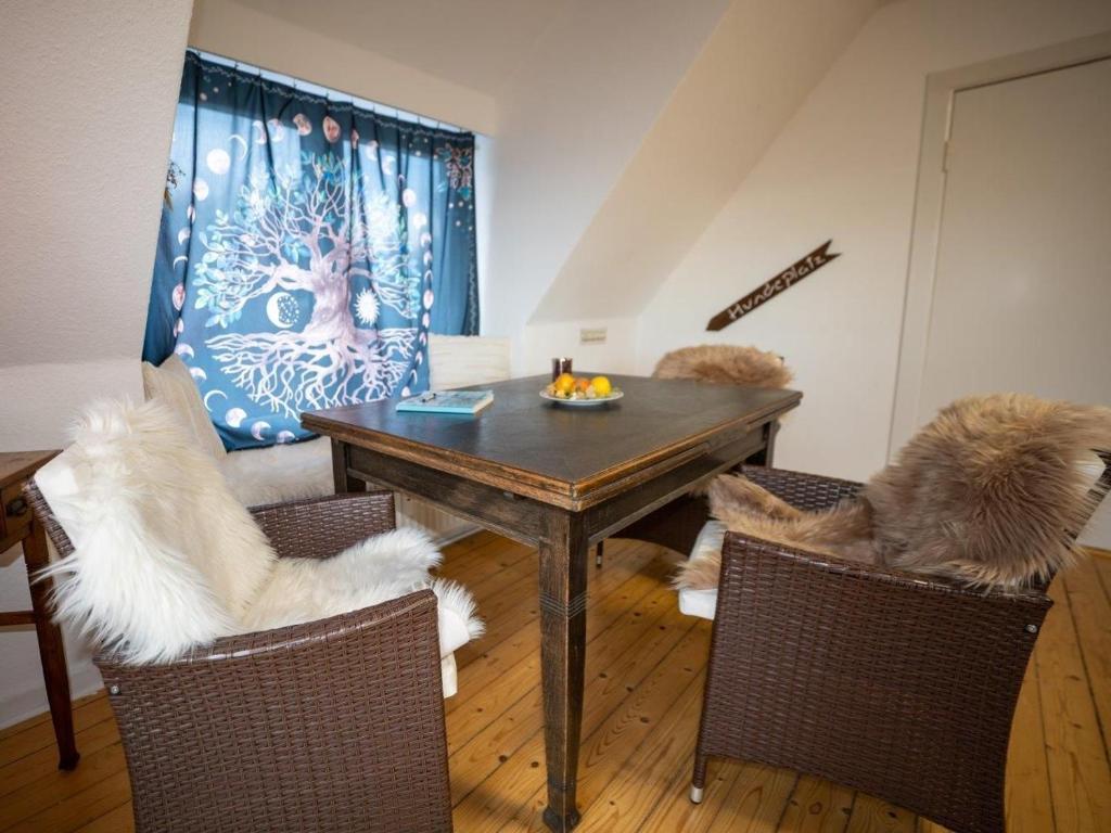 Posezení v ubytování 194 Fewo Dat LütjeHuus mit Dachterrasse im ersten Stock