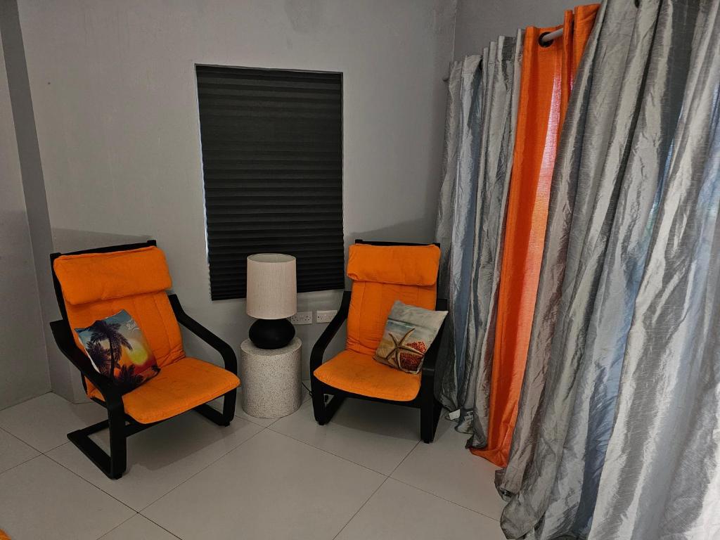 Posezení v ubytování Coconut Breeze SVG - 1 bdrm