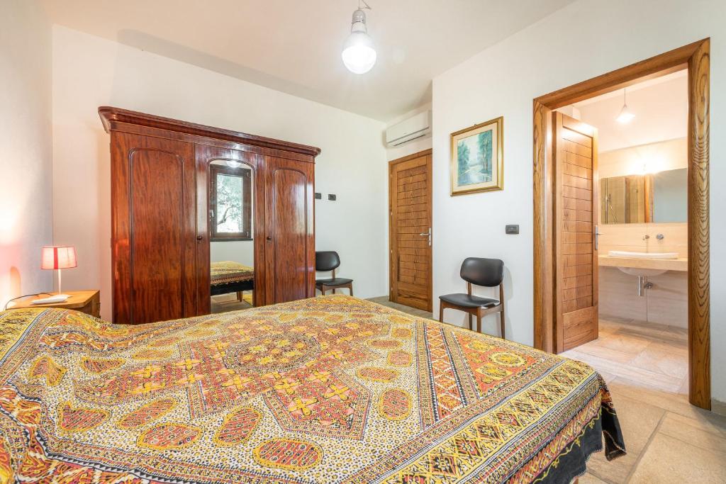 Łóżko lub łóżka w pokoju w obiekcie Villa Fico