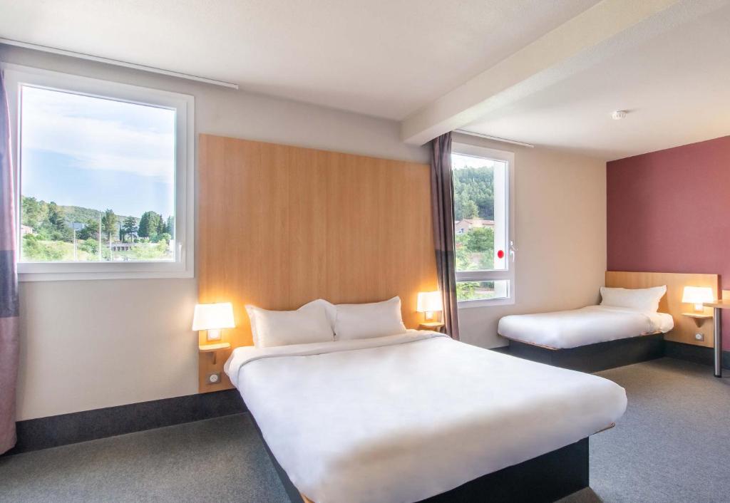 Postel nebo postele na pokoji v ubytování B&B HOTEL Alès - Pôle Mécanique