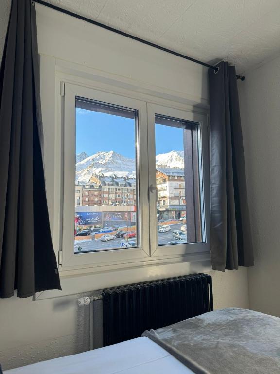 Postel nebo postele na pokoji v ubytování Hotel Panda