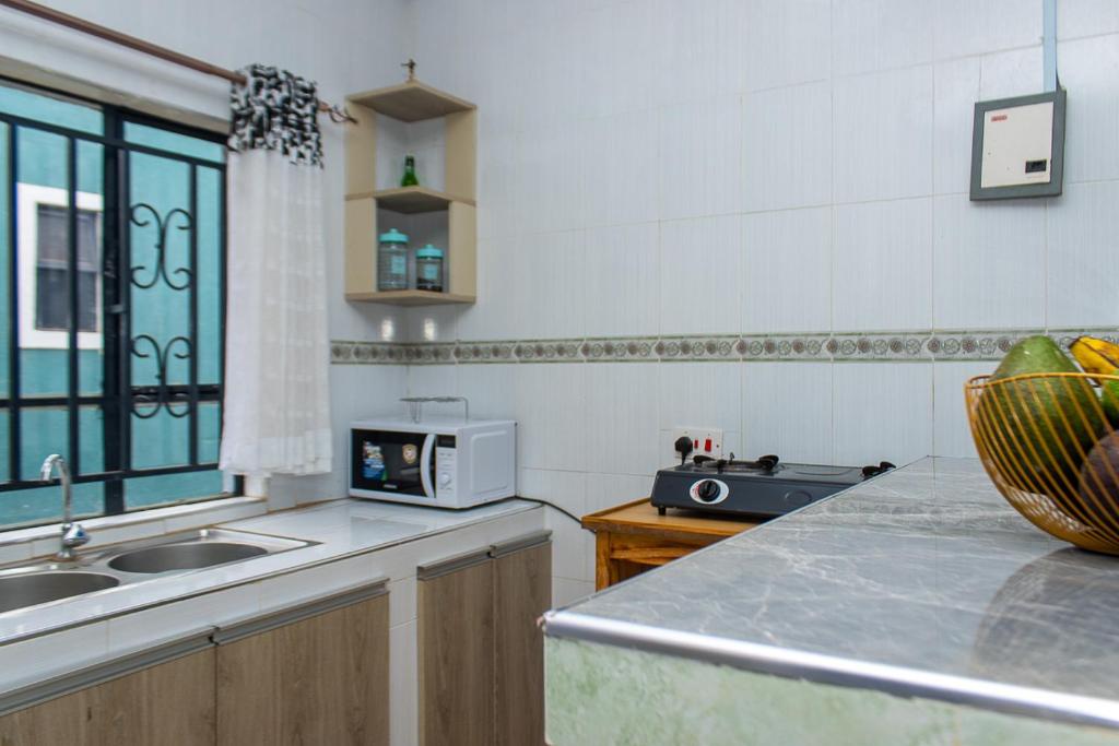 Kuchyň nebo kuchyňský kout v ubytování CRYSTAL HOMES By CHEMA