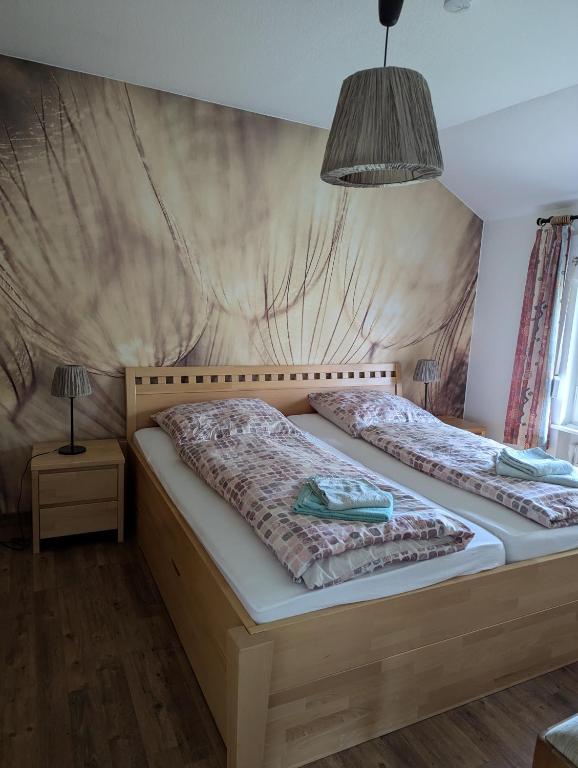 Postel nebo postele na pokoji v ubytování Ferienhaus "Kleiner Onkel"