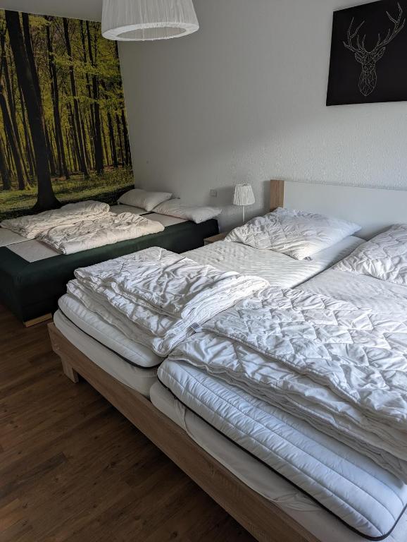 Postel nebo postele na pokoji v ubytování Ferienhaus "Kleiner Onkel"