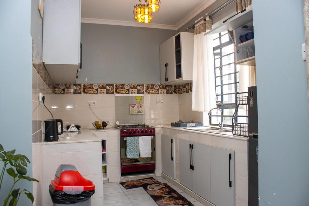 Kuchyň nebo kuchyňský kout v ubytování CRYSTAL HOMES By CHEMA