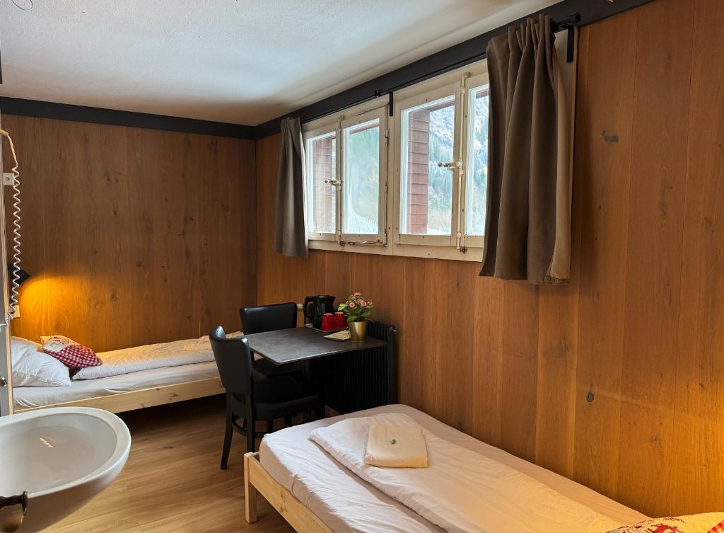 Postel nebo postele na pokoji v ubytování Hotel Hornerpub
