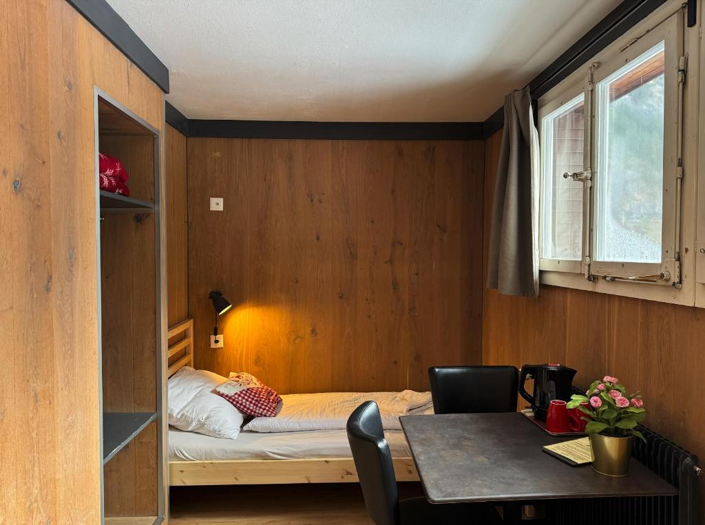 Postel nebo postele na pokoji v ubytování Hotel Hornerpub