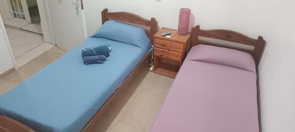 Ένα ή περισσότερα κρεβάτια σε δωμάτιο στο Alojamiento viajeros