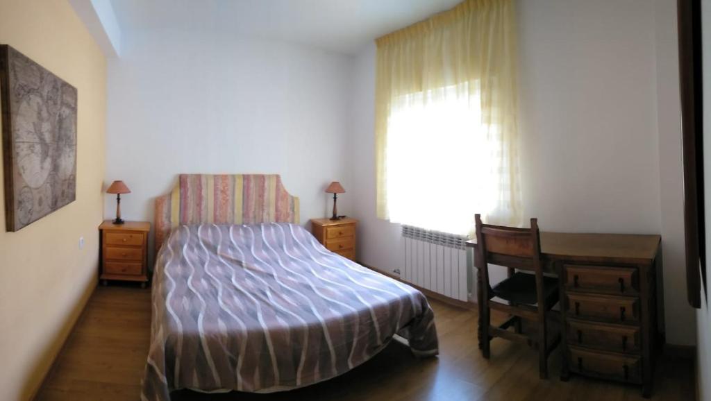 Postel nebo postele na pokoji v ubytování LAS AMAPOLAS