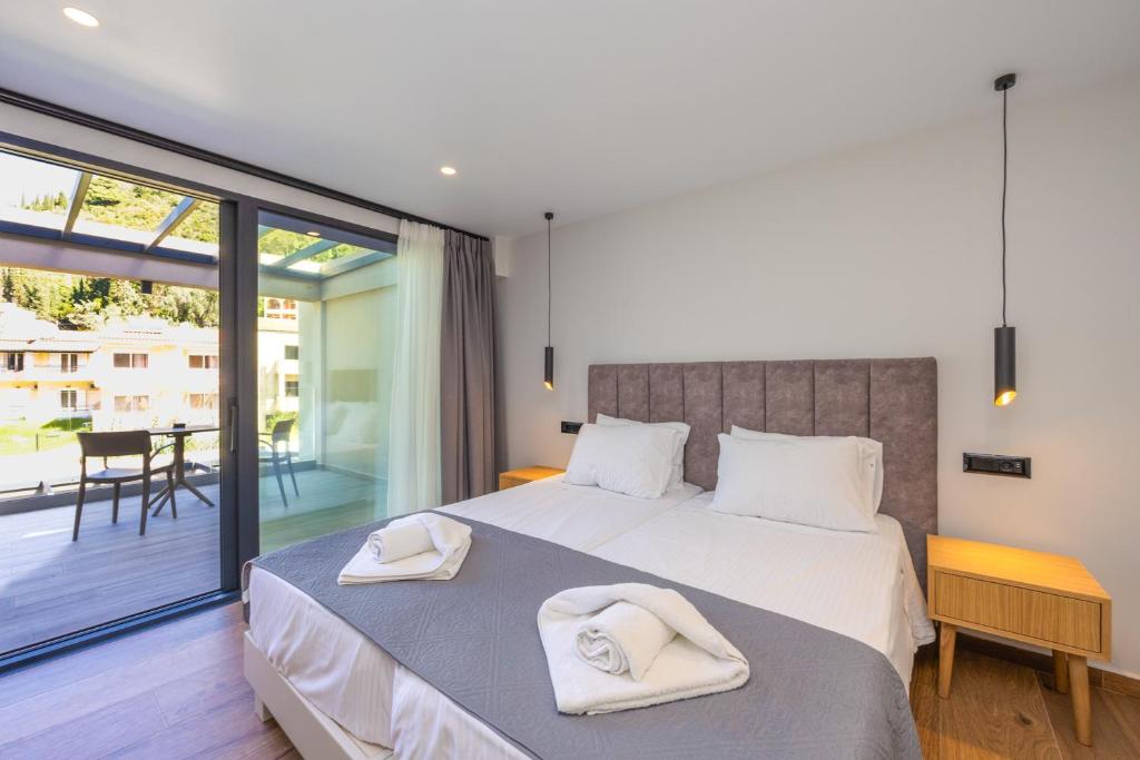 Postel nebo postele na pokoji v ubytování Nobile Hotel